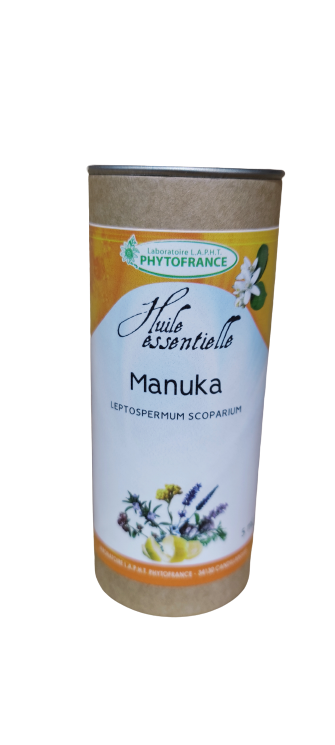 Grand pot à miel de Manuka blanc orné de motifs floraux et d'un couvercle doré sur fond uni