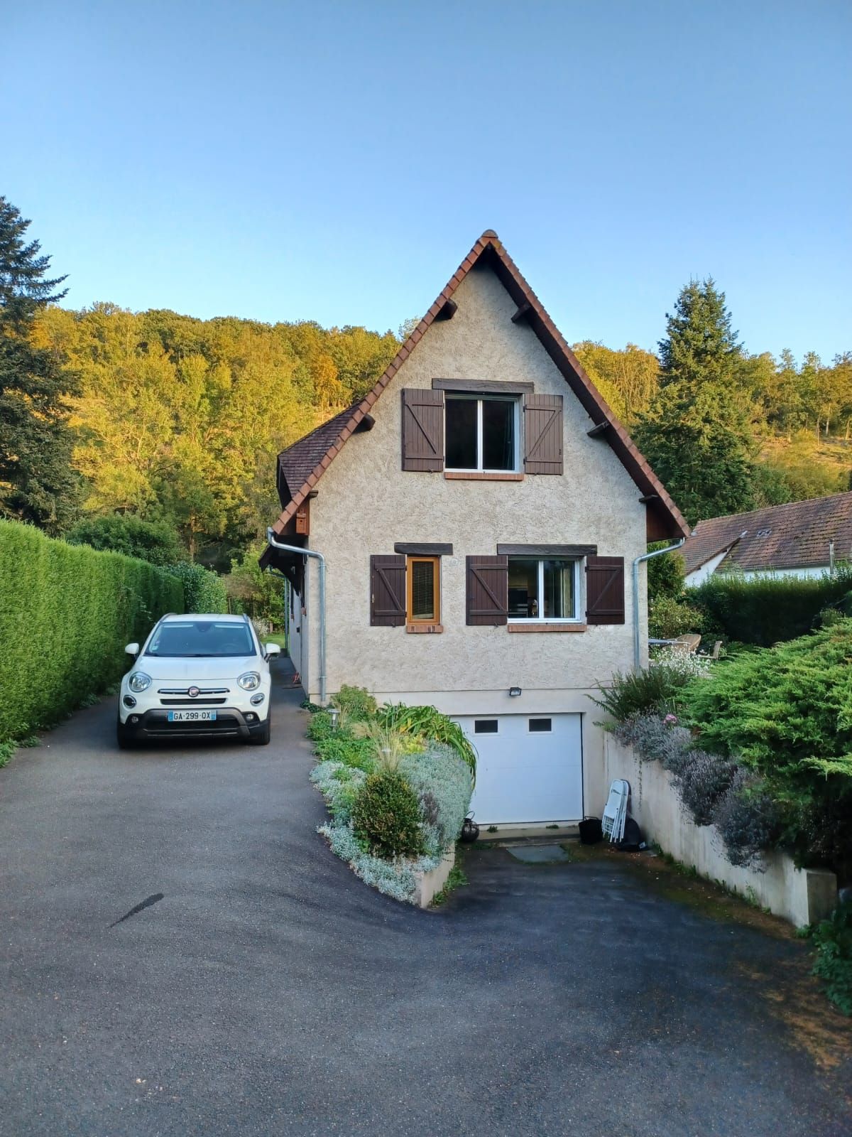 Maison avec garage au sous-sol