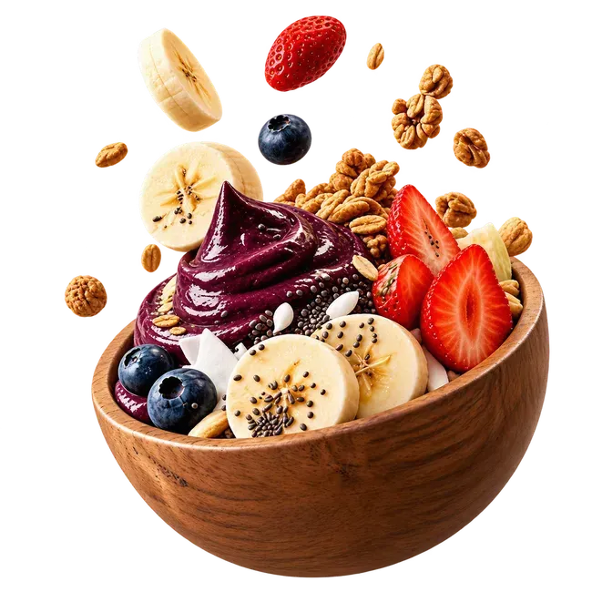 Bol de madera con açaí, cubierto con fresas, plátano, arándanos, kiwi, nueces y semillas de chía.