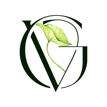 Una letra g con una hoja verde en el medio