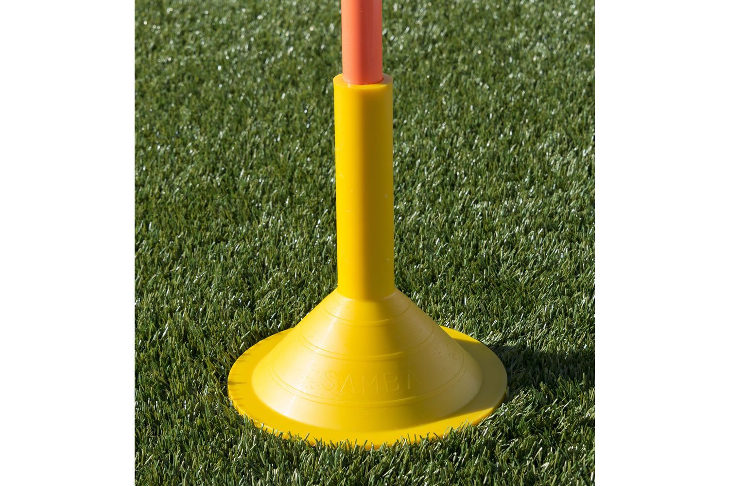 A yellow cone with a red pole attached to it