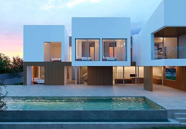 Una casa moderna con piscina delante de ella.