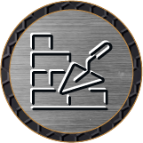 Une truelle et un mur de briques.