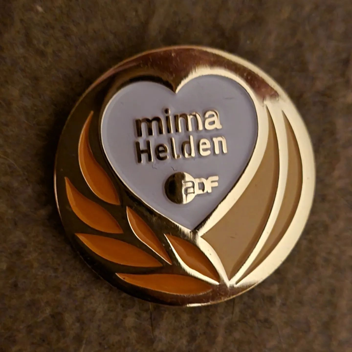 Abzeichen mima Helden