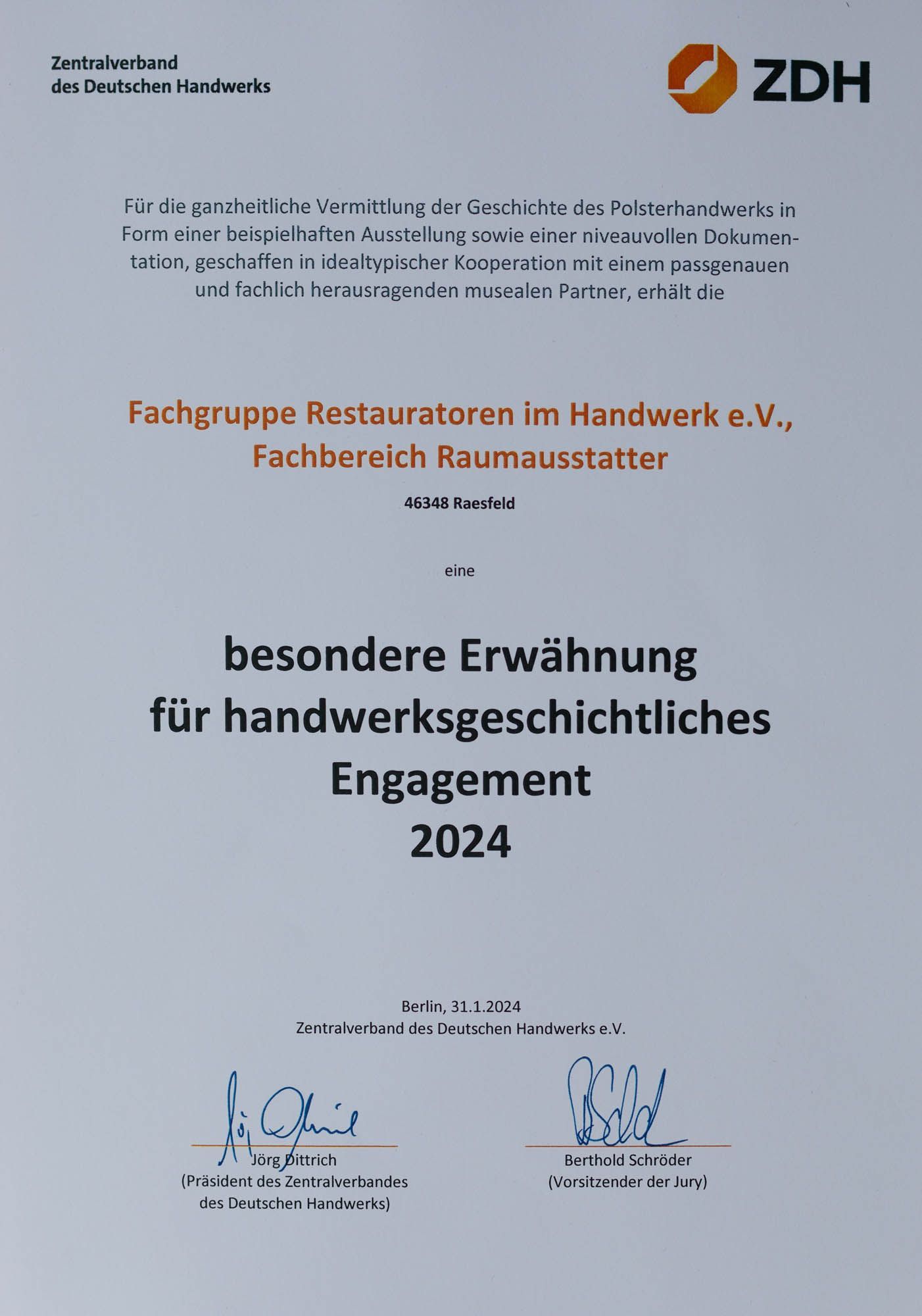 A certificate that says besondere erwahnung for handwerksgeschichtliches engagement 2024