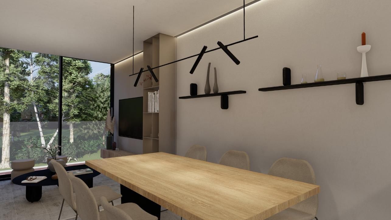 Comedor con mesa larga de madera, detalles en negro y gran ventanal con vista a los árboles.