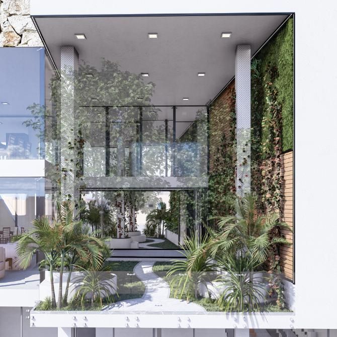 Exterior de casa moderna con exuberante vegetación, paredes de vidrio y un camino.