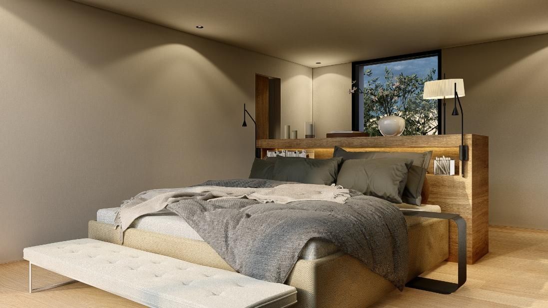 Dormitorio con cama, banco, ventana y cabecero de madera con luces.