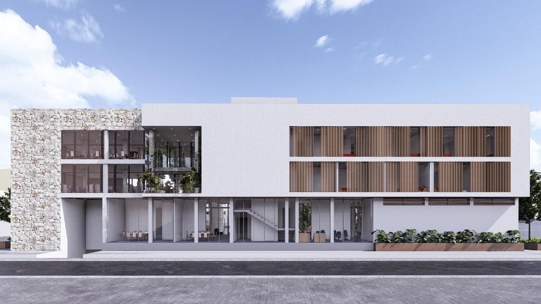 Edificio moderno de dos plantas con sección con textura de piedra, listones de madera y ventanas de vidrio 