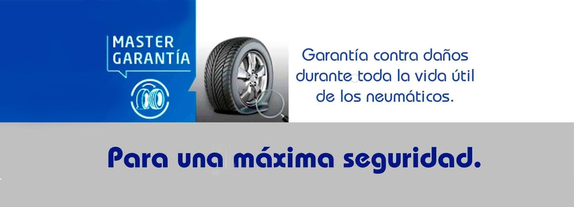 Un coche rojo circula por una carretera con un logotipo Michelin en el fondo.