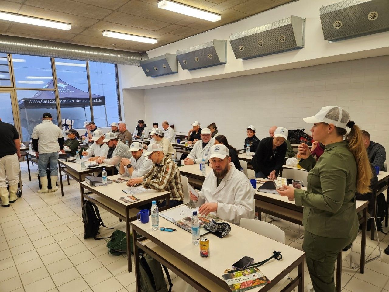 Gespannte Zuhörer beim Seminar