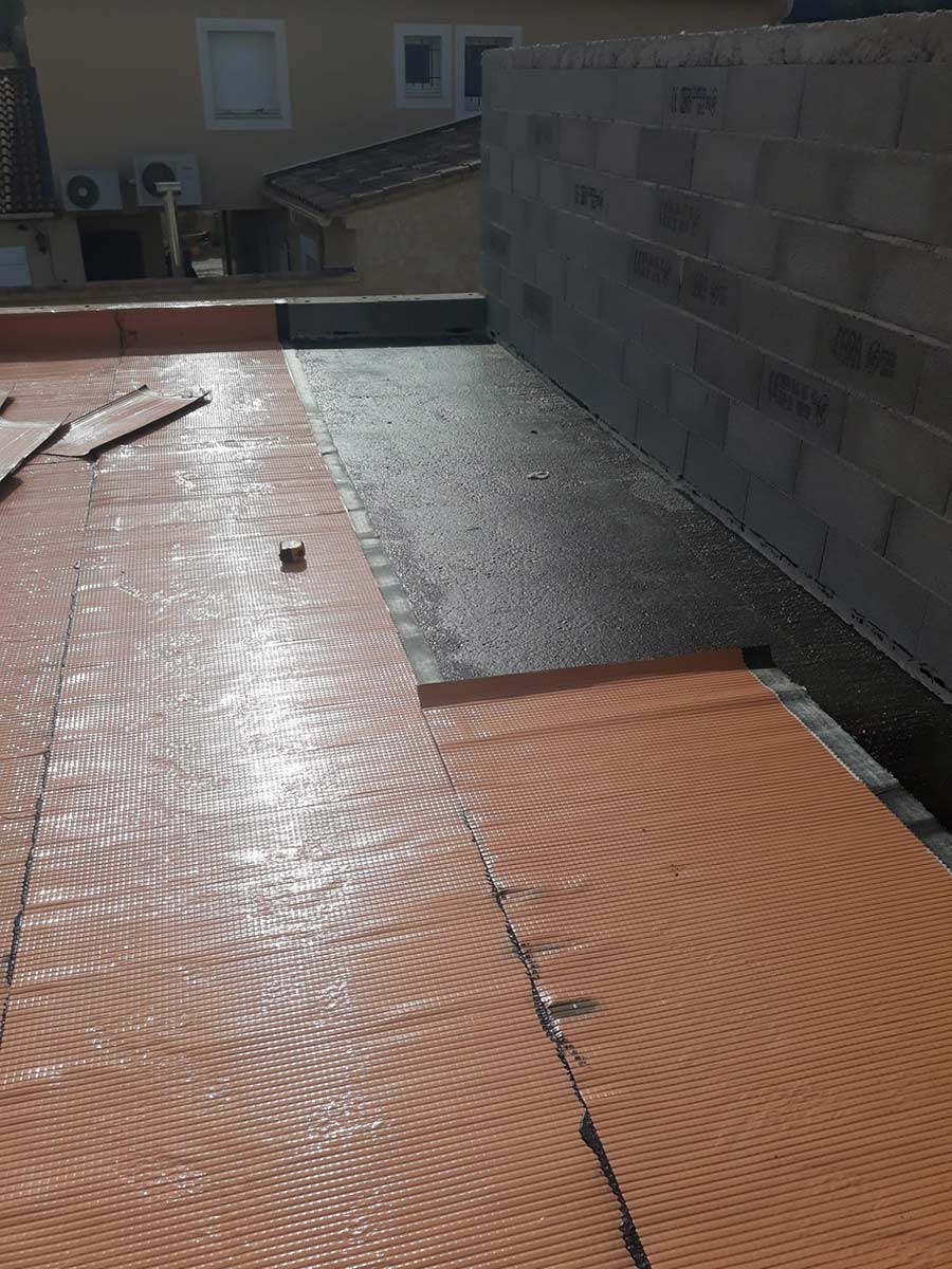 Isolation sur toit plat reverse