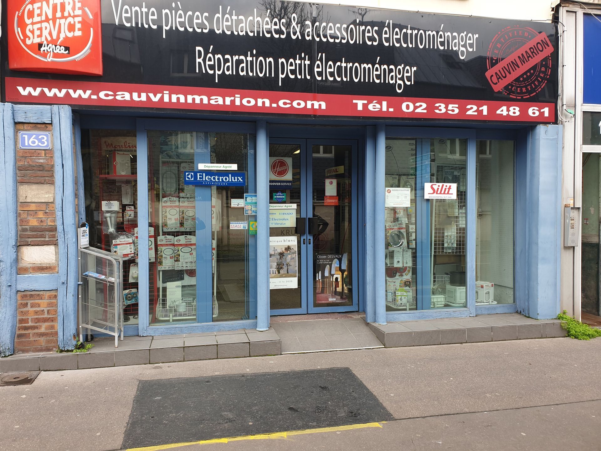 A store front with a sign reading 