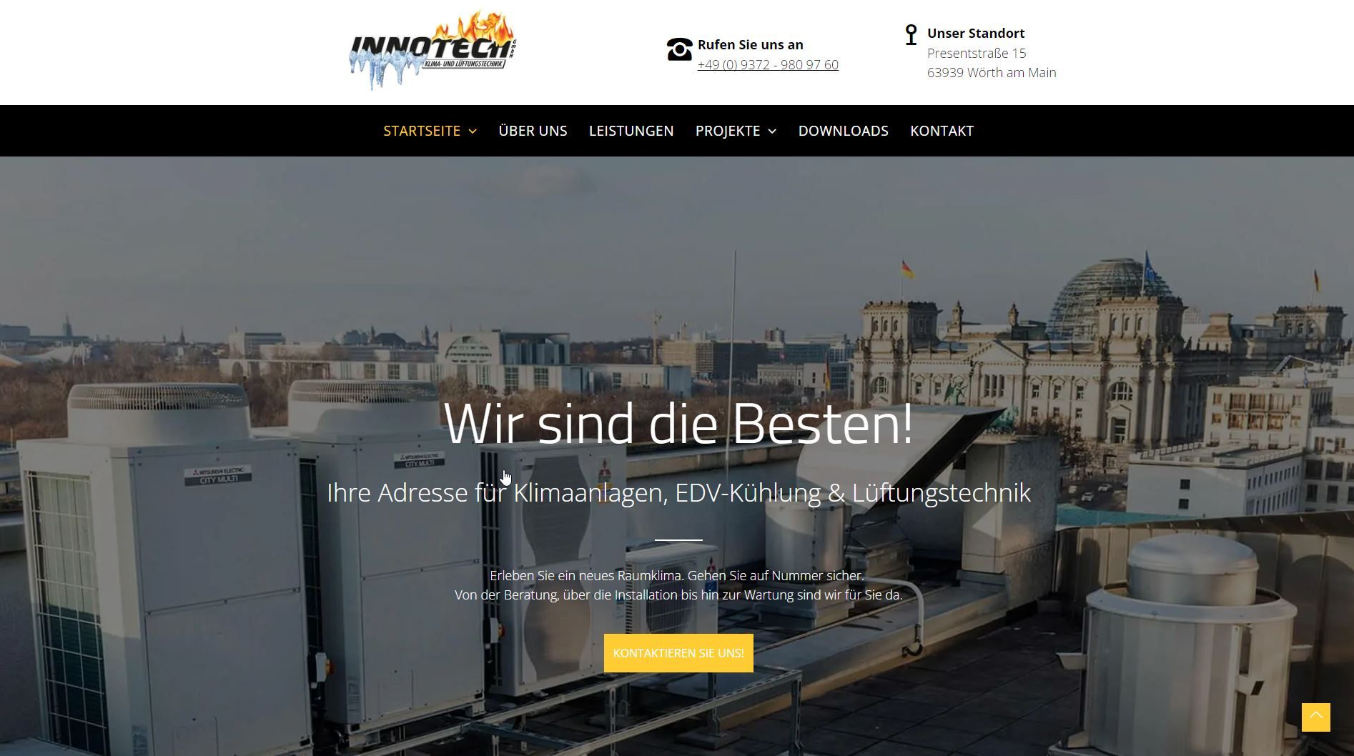 Website homepage of Mimotec, featuring rooftop HVAC equipment with a cityscape backdrop;