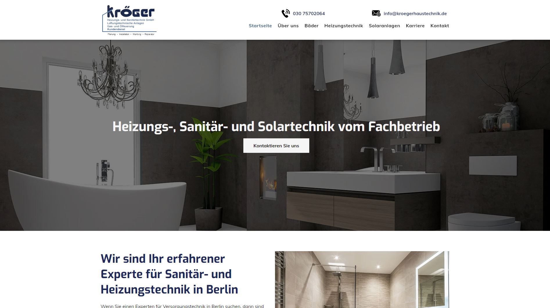 Website-Header für Anocer, ein Berliner Unternehmen. Zeigt ein modernes Badezimmer mit dem Text „Heizung, Sanitär und Solartechnik“.