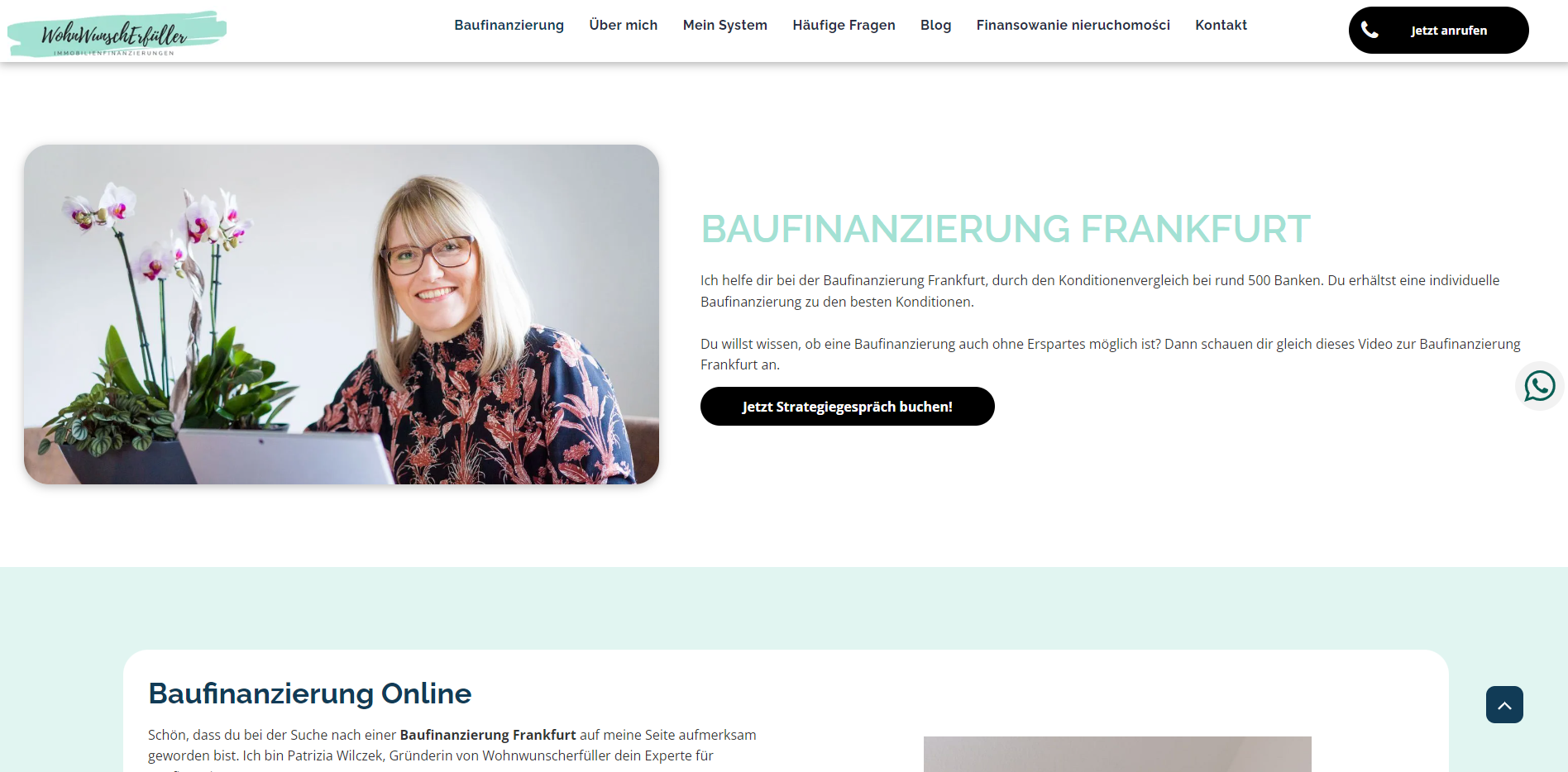 Woman with glasses smiles at laptop; website for Baufinanzierung in Frankfurt.