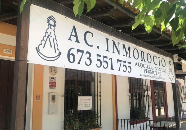 Un cartel que dice ac inmoroco.