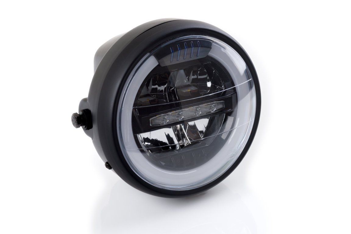 Faro LED negro para motocicleta con halo blanco.