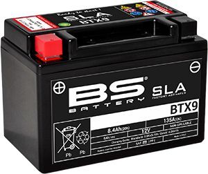 Batería BS BTX9 negra para motocicleta, con tapa de terminales roja e iconos de advertencia.