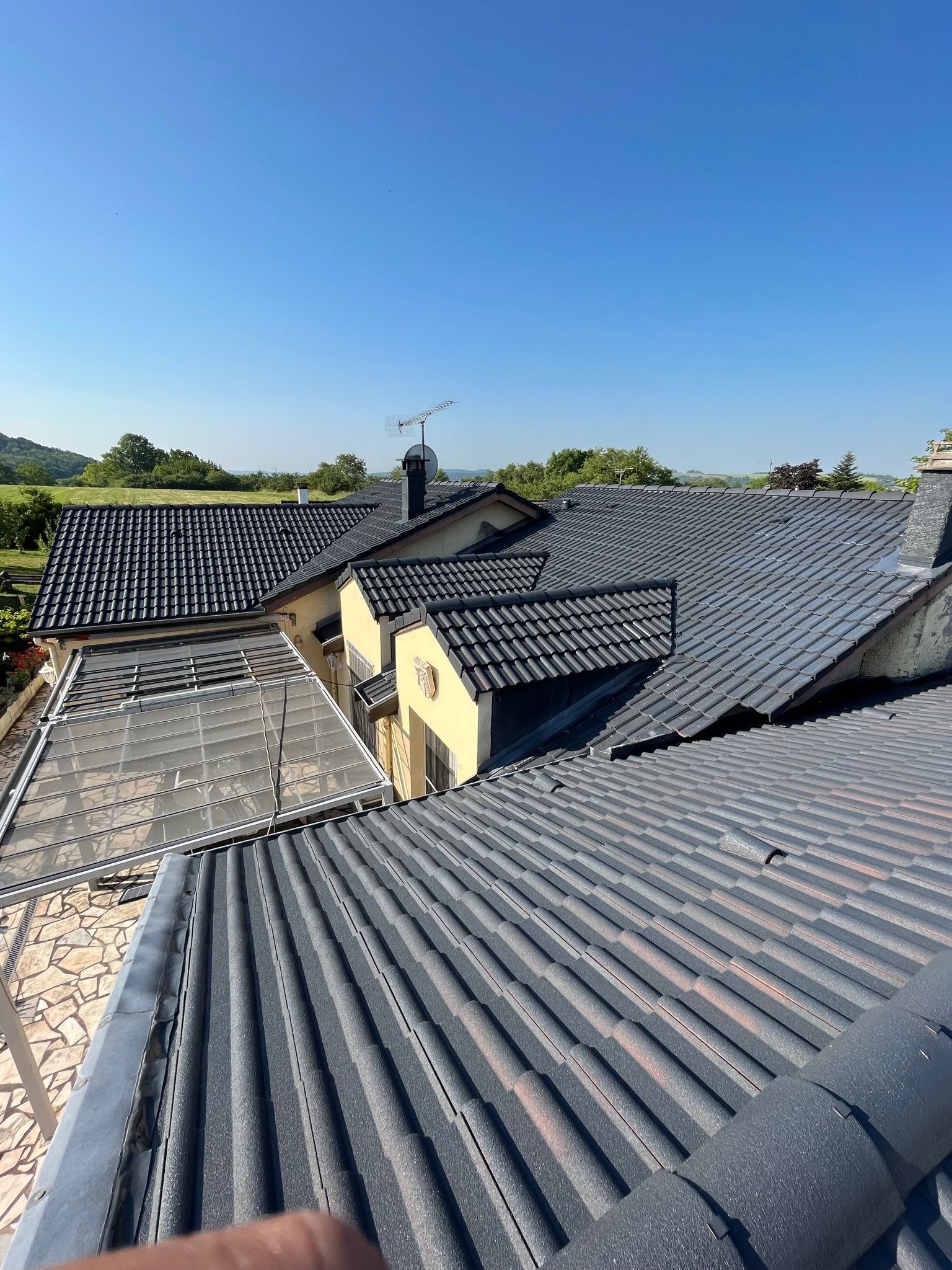 Couverture d'une maison et une véranda entièrement rénovée