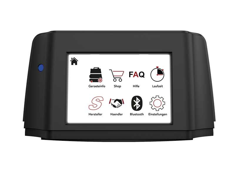 Ein schwarzes Gerät mit einem Bildschirm mit der Aufschrift „FAQ“.