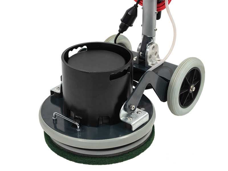 Eine Nahaufnahme einer Maschine mit Rädern auf einem weißen Hintergrund.