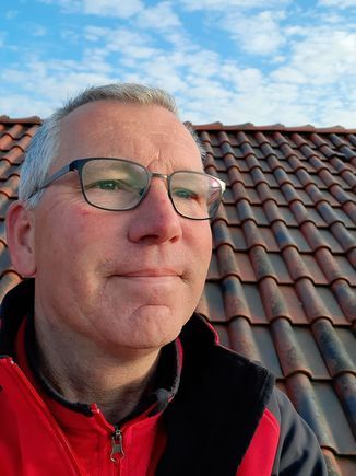 Dachdecker Harald Büschenfeld Portrait auf einem Dach