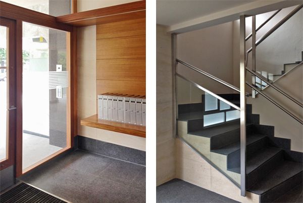 Una imagen de una puerta y escaleras en un edificio.