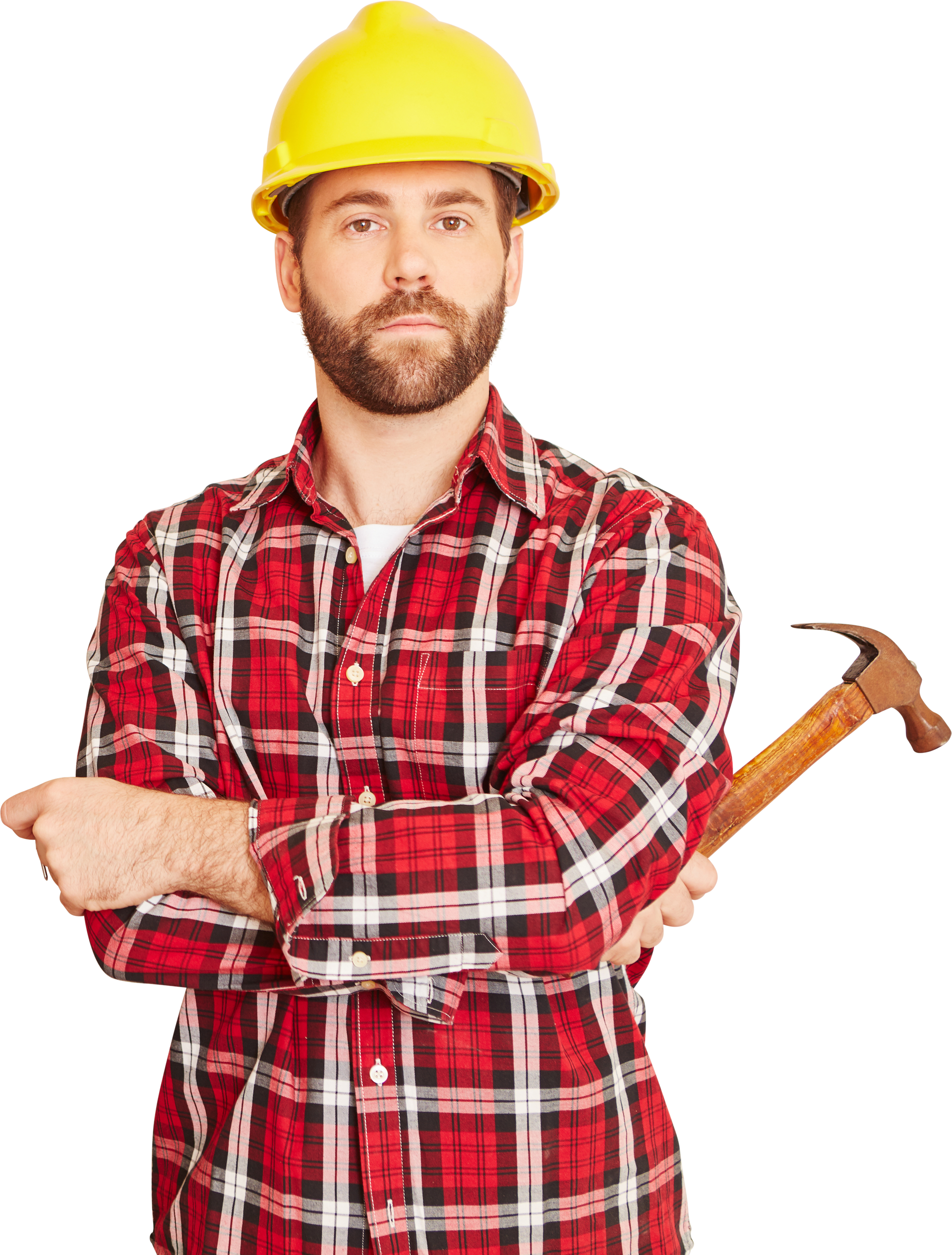 Ouvrier du bâtiment portant un casque jaune et une chemise à carreaux rouges, tenant un marteau et pointant.