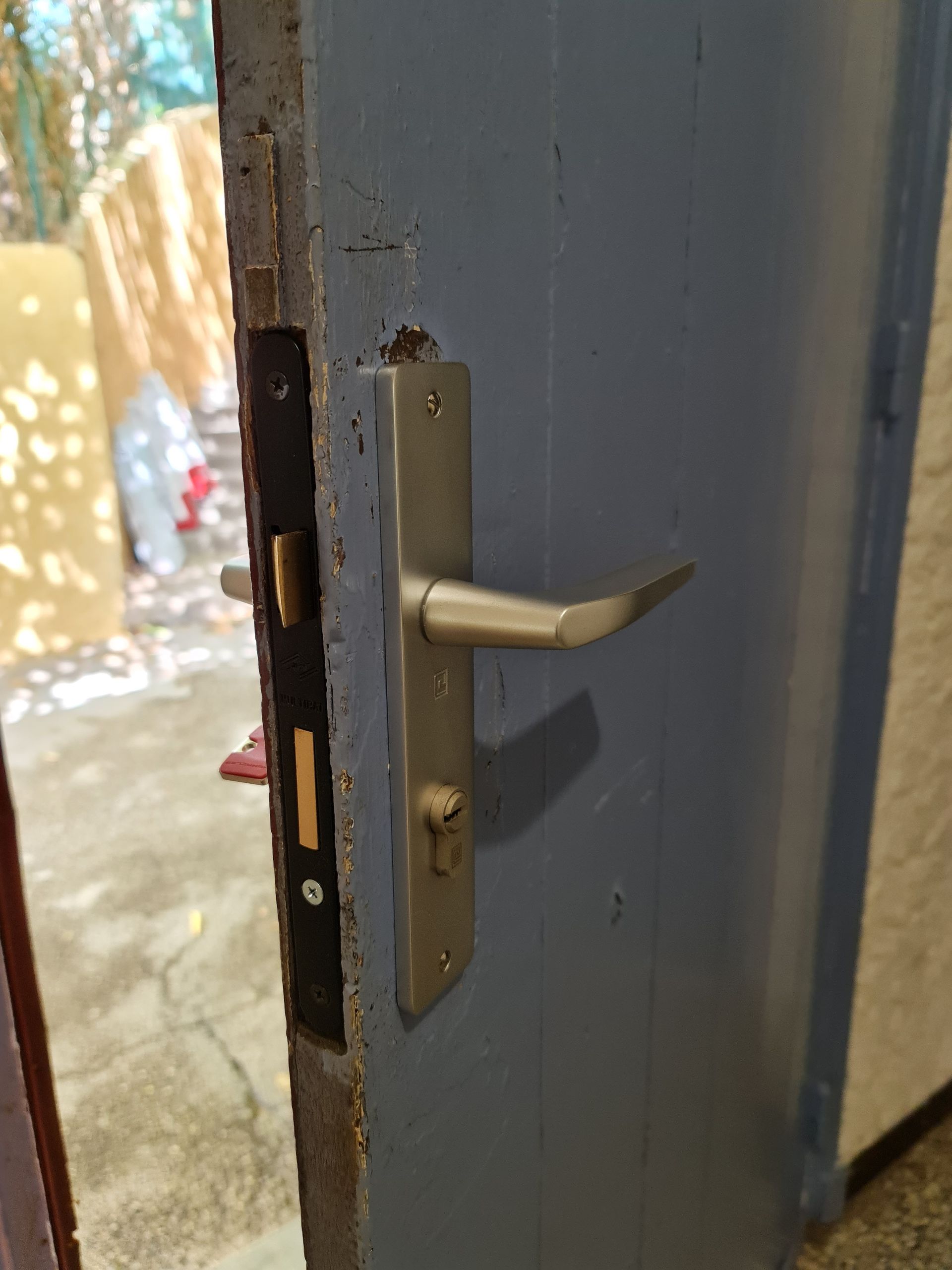 Poignée de porte en acier