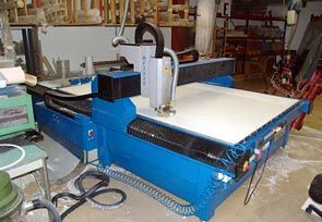 Elega SA - parc machines - découpe de panneaux et fabrication d'objets sur mesure en matière plastique