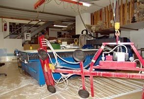 Elega SA - parc machines - découpe de panneaux et fabrication d'objets sur mesure en matière plastique