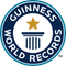 Logotipo de Guinness World Records: círculo azul y blanco con texto, estrella dorada y columnas.