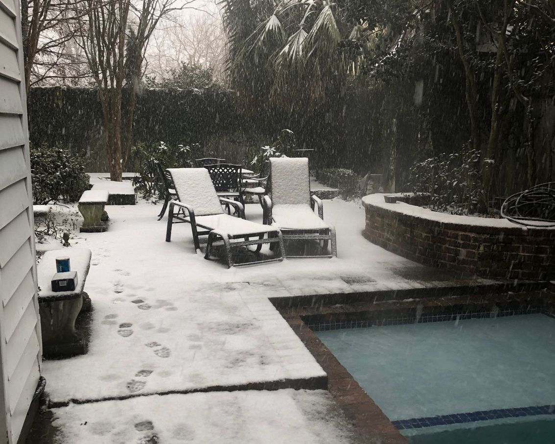 footsteps in snow at The Iris Charleston