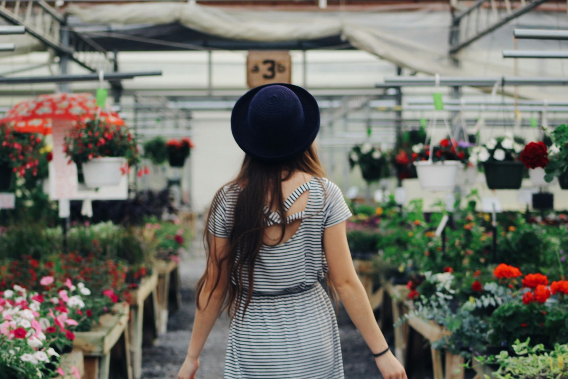 a girl at a flower market