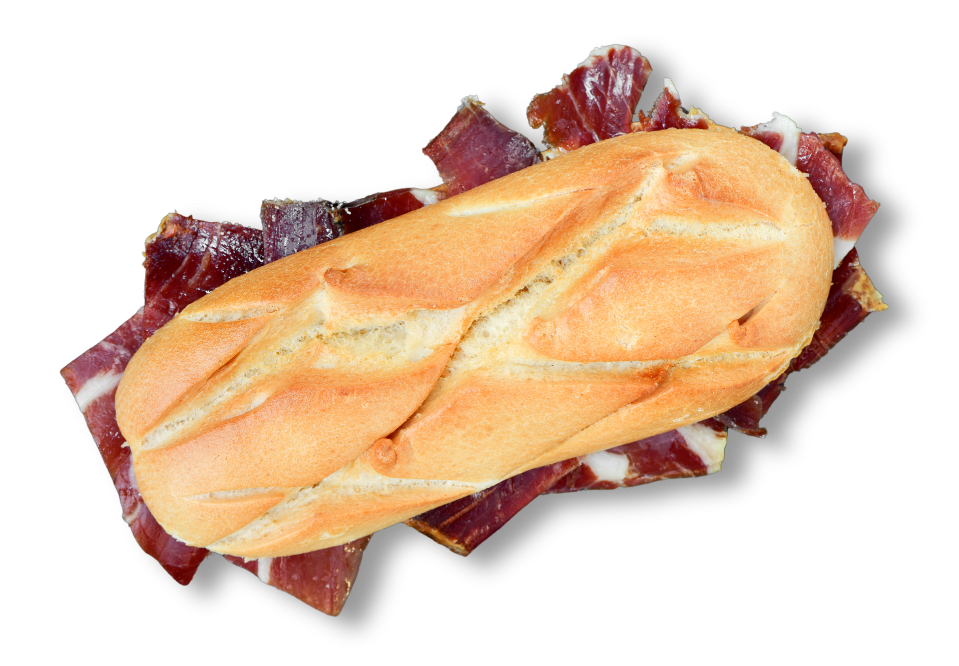 Una hogaza de pan con carne sobre un fondo blanco.