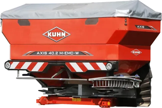 Un esparcidor Kuhn rojo está sobre un fondo blanco.