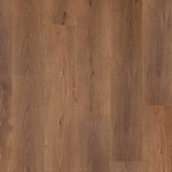 Tablones de suelo de madera en varios tonos de marrón.