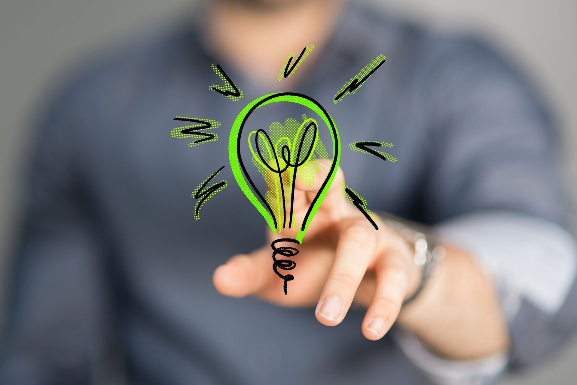 Dessin d'ampoule verte avec une main appuyant sur l'ampoule