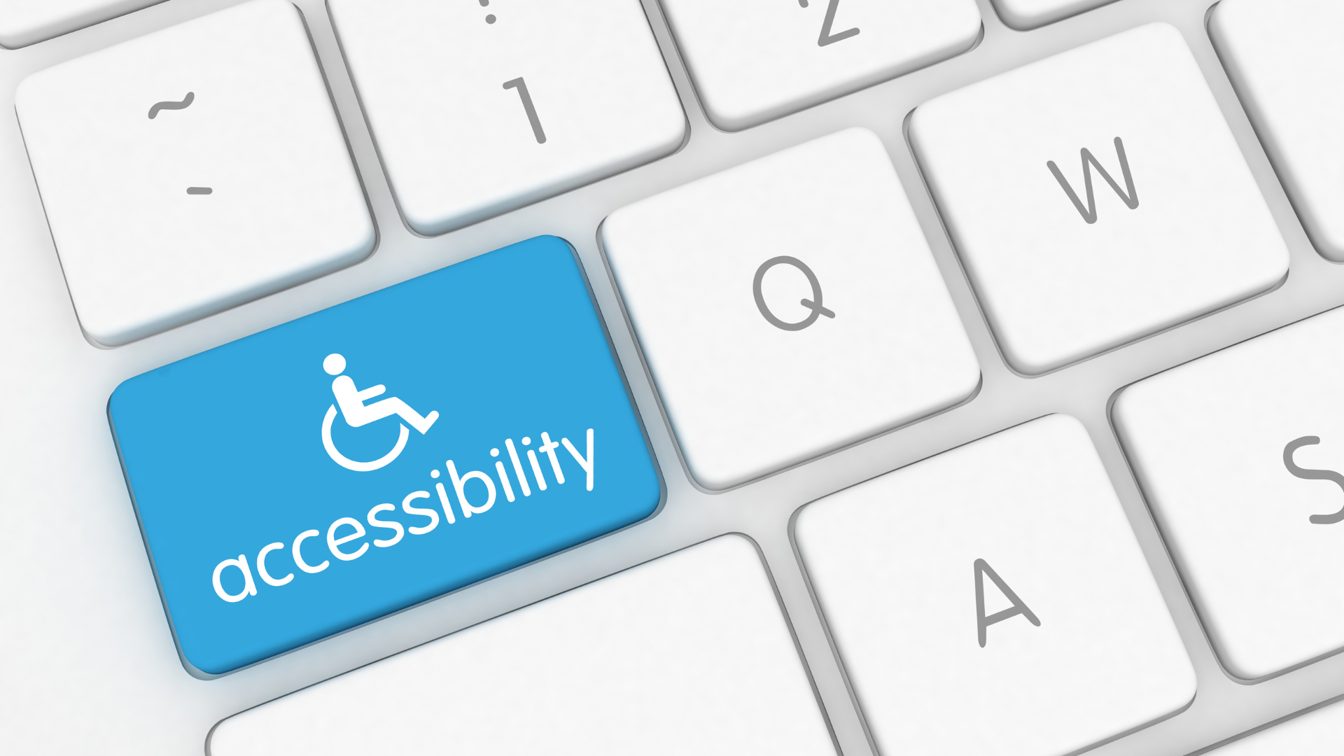 A keyboard with a blue button that says accessibility