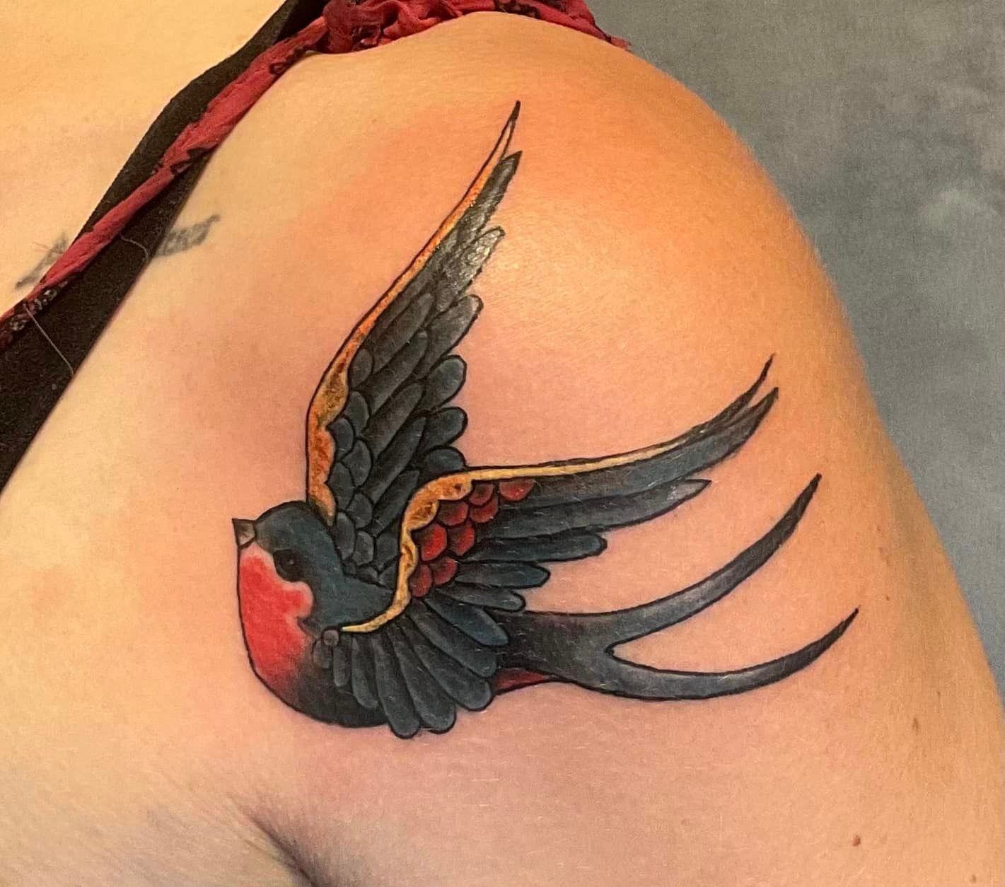 Tatouage représentant un rouge-gorge