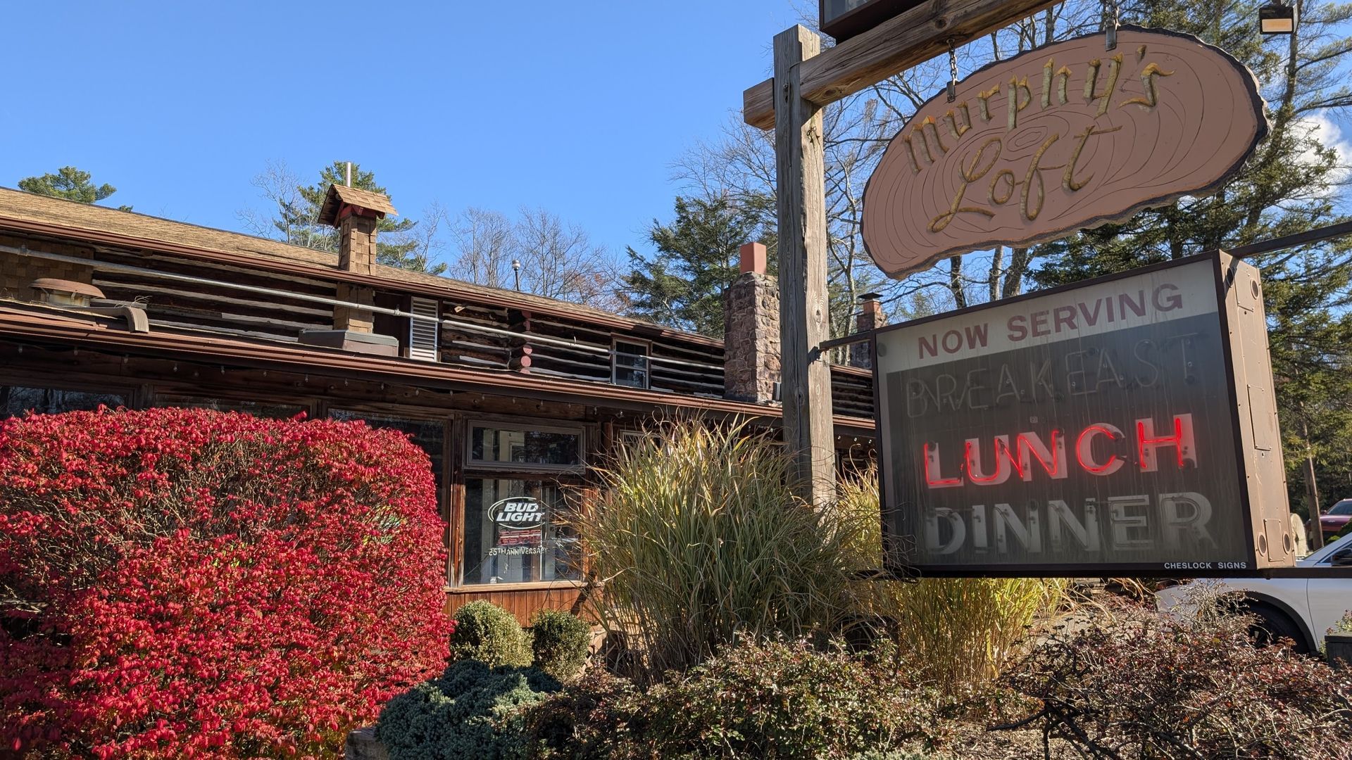 Restaurant exterior with sign: 