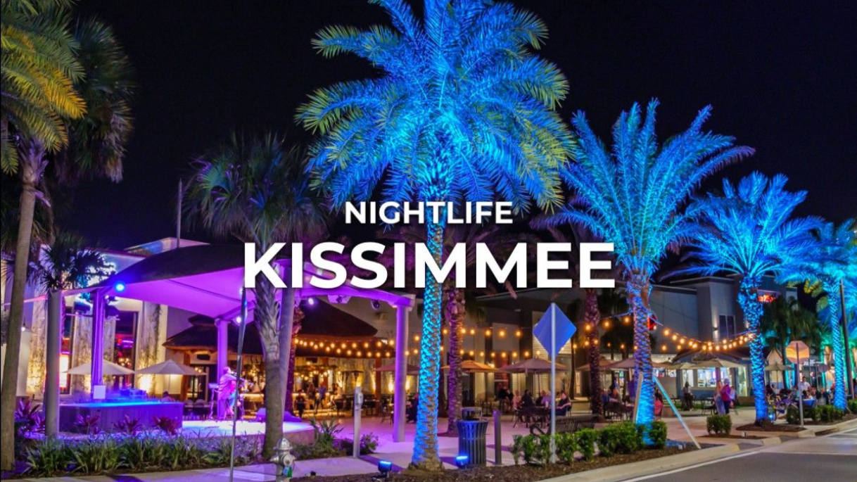 Nightlife in Kissimmee: Illuminated palm trees and outdoor venue at night.