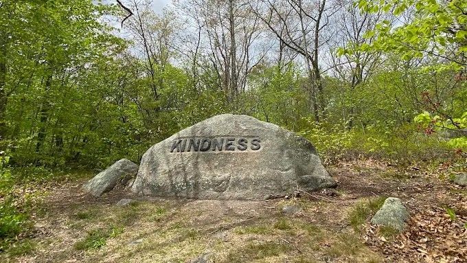 A boulder with the word