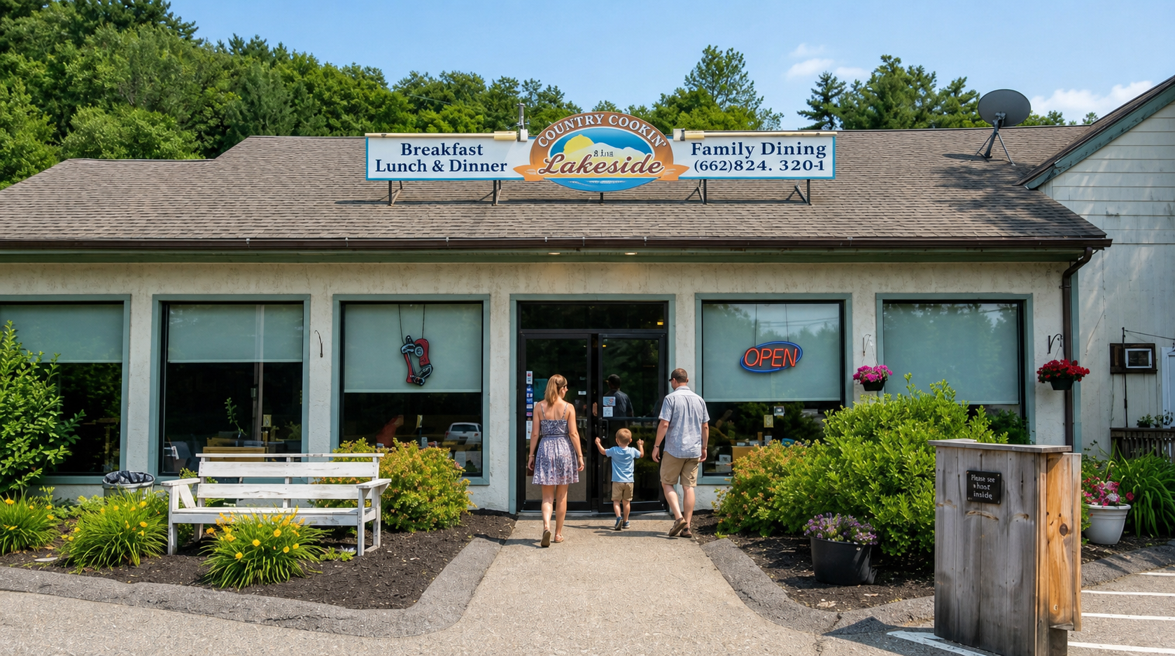 Small shopfront with people standing at the entrance, white bench, and a sign above the door.