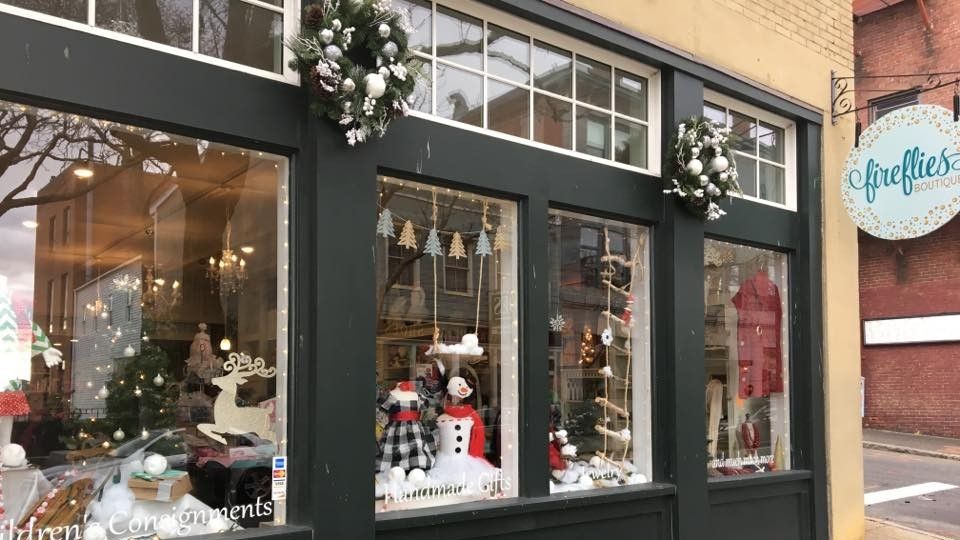 Storefront decorated for Christmas, 