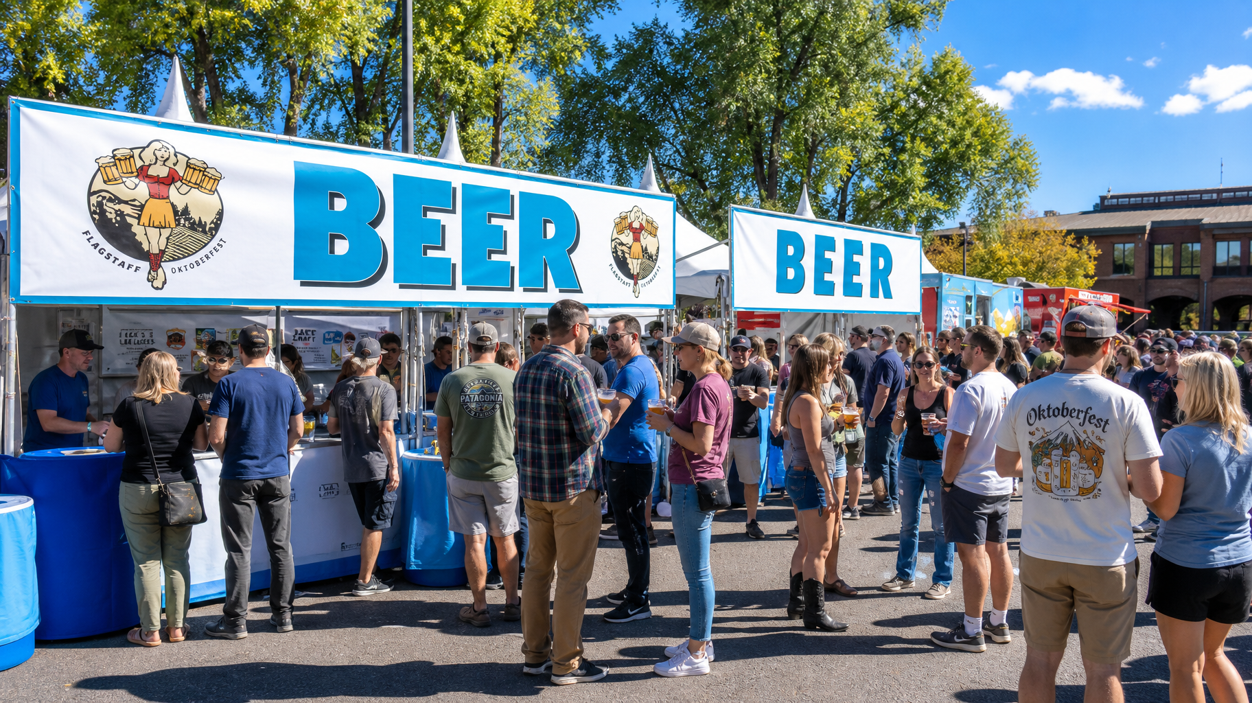 Crowd at outdoor beer festival booth with large BEER signs and people waiting in line