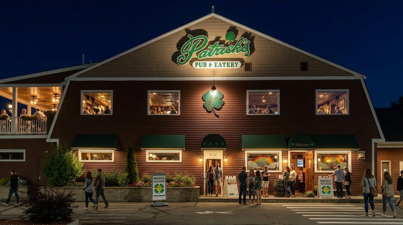 Night view of a rustic store with green signage and warm-lit windows, people gathered outside.