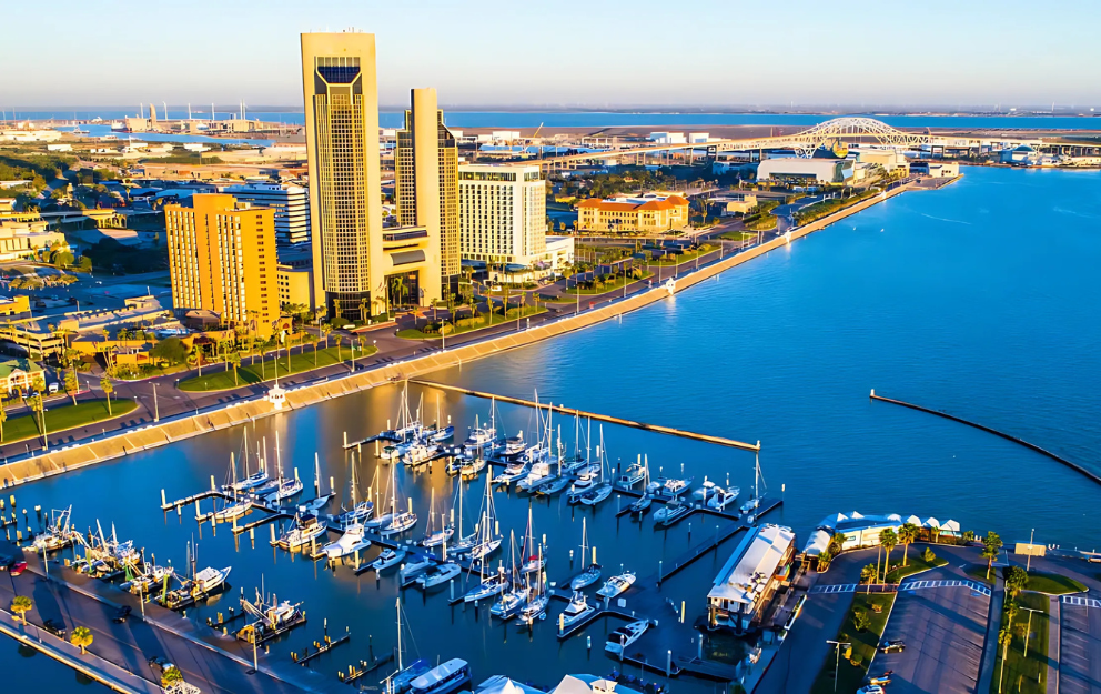 An aerial view of a marina with boats docked in Corpus Christi, Texas