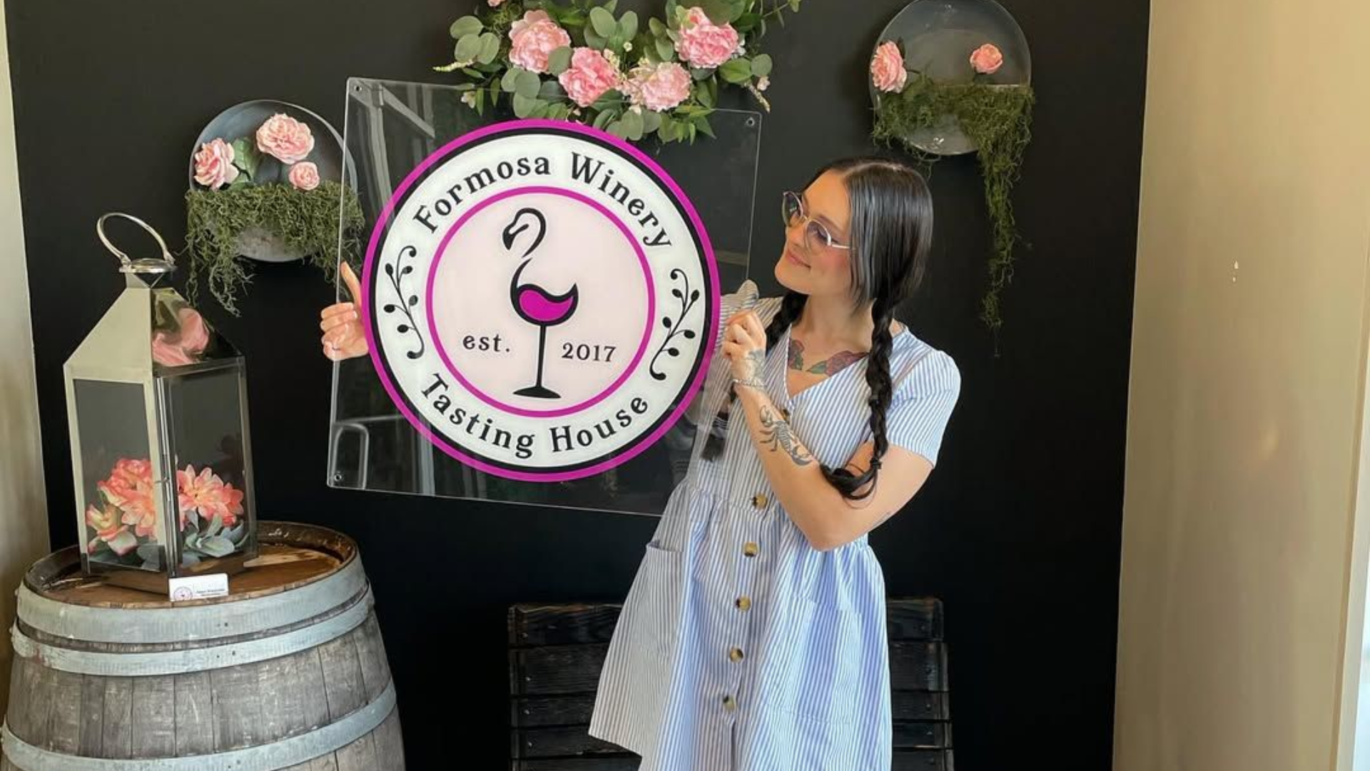 Woman holding a sign for